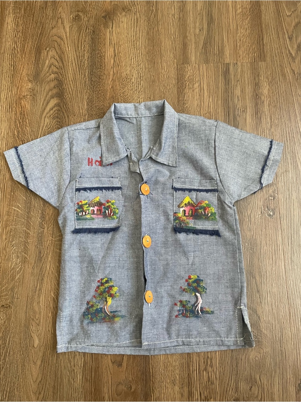 Handmade in Haiti Kids Short Sleeve Blue Chambray Shirt with Tropical Print